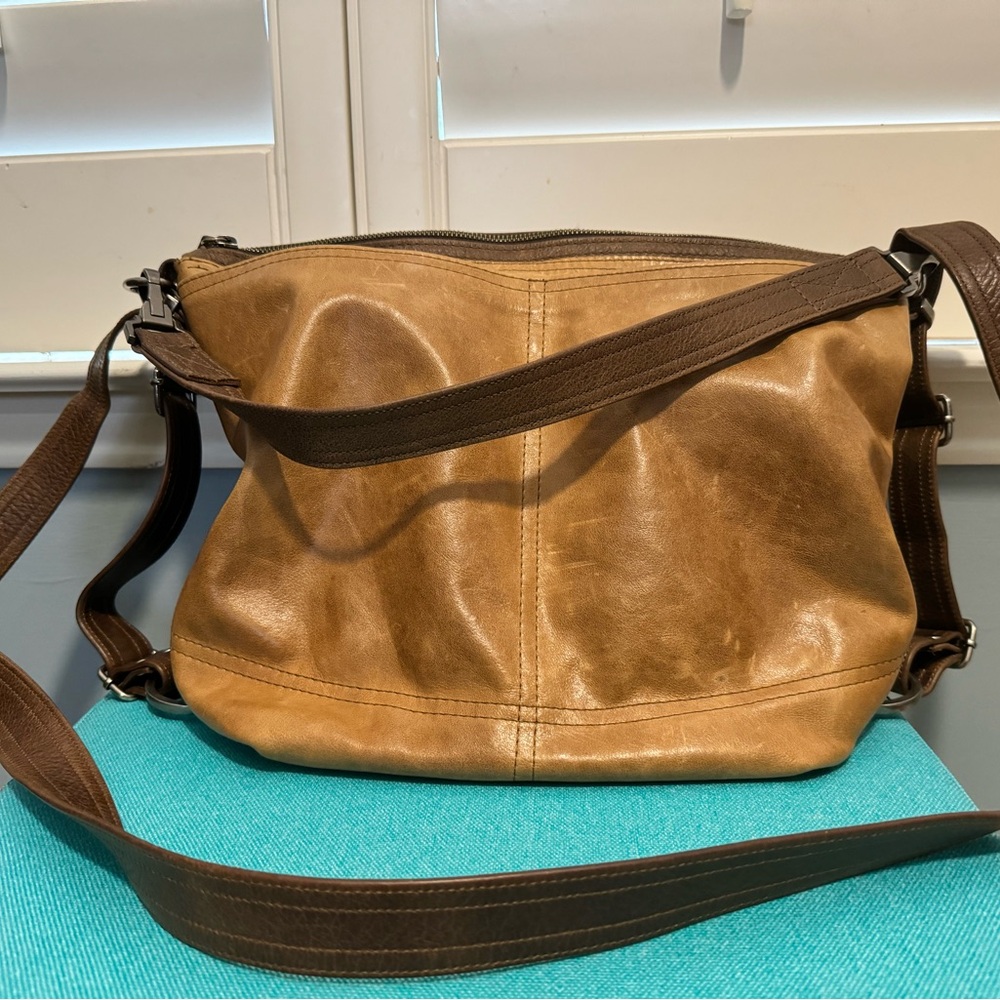 Rough & Tumble VOP medium distressed saddle with mango scroll lining.